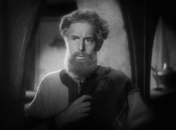 Movie still from “The Sign of the Cross” (1932), directed by Cecil B. DeMille – An old man with a beard and a mustache; Close Up shot, Low angle