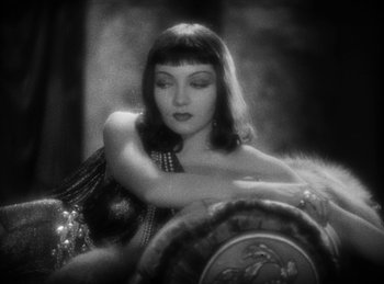 Movie still from “The Sign of the Cross” (1932), directed by Cecil B. DeMille – A black - and - white photo of a woman in a dress; Close Up shot, High angle