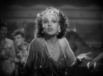 Movie still from “The Sign of the Cross” (1932), directed by Cecil B. DeMille – An old photo of a woman in a costume; Close Up shot, Low angle