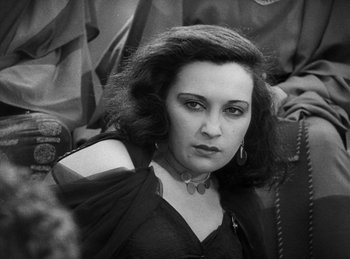 Movie still from “The Sign of the Cross” (1932), directed by Cecil B. DeMille – A black - and - white photo of a woman in a black dress; Close Up shot, High angle