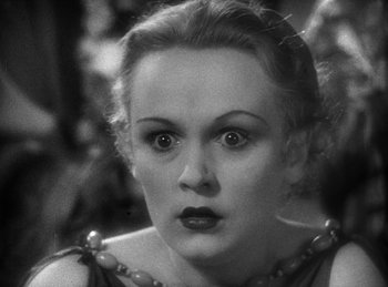 Movie still from “The Sign of the Cross” (1932), directed by Cecil B. DeMille – An old photo of a woman looking at the camera; Close Up shot, High angle