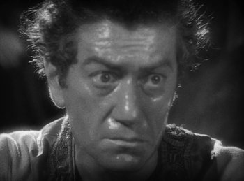 Movie still from “The Sign of the Cross” (1932), directed by Cecil B. DeMille – An older man is looking at the camera; Close Up shot, High angle