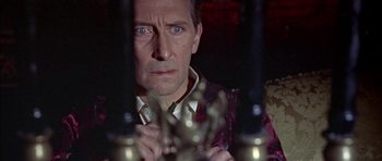 Movie still from “The Skull” (1965), directed by Freddie Francis – A person looking at the camera; Close Up shot, High angle