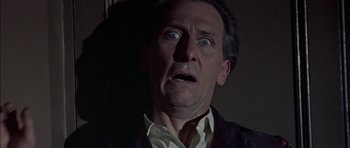 Movie still from “The Skull” (1965), directed by Freddie Francis – An older man with a surprised look on his face; Close Up shot, Low angle