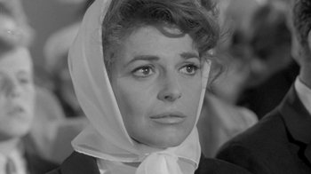 Movie still from “The Slender Thread” (1965), directed by Sydney Pollack – Black and white photograph of a woman wearing a head scarf; Close Up shot, Low angle