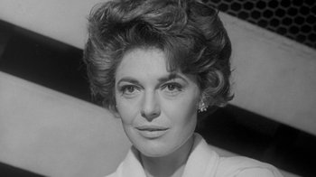 Movie still from “The Slender Thread” (1965), directed by Sydney Pollack – A black and white photo of a woman with big hair; Close Up shot, Low angle