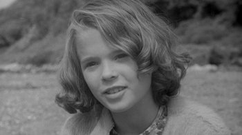 Movie still from “The Slender Thread” (1965), directed by Sydney Pollack – A black and white photo of a young woman; Close Up shot, High angle