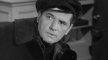 Movie still from “The Slender Thread” (1965), directed by Sydney Pollack – Black and white photograph of a man wearing a hat; Close Up shot, Low angle