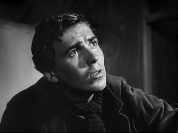 Movie still from “The Song of Bernadette” (1943), directed by Henry King – Black and white photograph of a man looking up; Close Up shot, Low angle