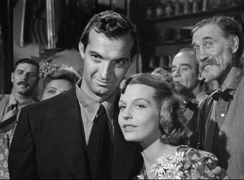 Movie still from “The Southerner” (1945), directed by Jean Renoir – A black and white photo of a man and a woman; Close Up shot, Low angle