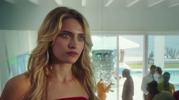 Movie still from “The Space Between” (2021), directed by Rachel Winter – A beautiful blonde woman with blue eyes; Close Up shot, Over the shoulder angle