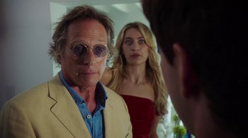 Movie still from “The Space Between” (2021), directed by Rachel Winter – A man and a woman in front of another man; Close Up shot, Over the shoulder angle