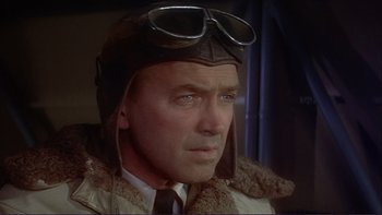 Movie still from “The Spirit of St. Louis” (1957), directed by Billy Wilder – An older man wearing a pilot's jacket and goggles; Close Up shot, Low angle
