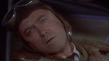 Movie still from “The Spirit of St. Louis” (1957), directed by Billy Wilder – A person wearing a pilot's hat; Close Up shot, Low angle