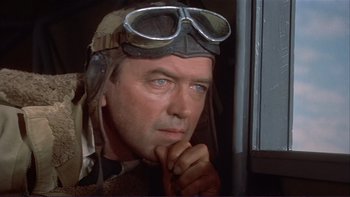 Movie still from “The Spirit of St. Louis” (1957), directed by Billy Wilder – An older man wearing a helmet and goggles; Close Up shot, Low angle