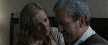 Movie still from “The Square” (2008), directed by Nash Edgerton – A man and a woman looking at each other; Close Up shot, Over the shoulder angle