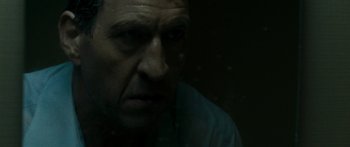 Movie still from “The Square” (2008), directed by Nash Edgerton – A person looking at the camera; Close Up shot, Low angle