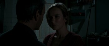 Movie still from “The Square” (2008), directed by Nash Edgerton – A man and a woman looking at one another; Close Up shot, Over the shoulder angle