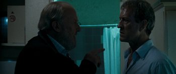 Movie still from “The Square” (2008), directed by Nash Edgerton – A man and a woman in a bathroom talking to each other; Close Up shot, Over the shoulder angle