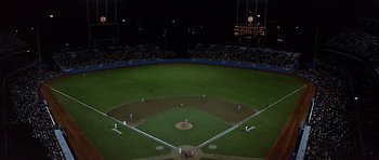 Movie still from “The Star Chamber” (1983), directed by Peter Hyams – A view of a baseball field at night from above; Extreme Wide shot, High angle