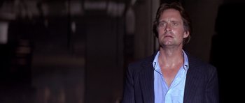 Movie still from “The Star Chamber” (1983), directed by Peter Hyams – A person wearing a suit and tie; Close Up shot, Low angle