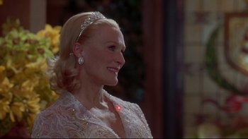 Movie still from “The Stepford Wives” (2004), directed by Frank Oz – A woman in a white dress and a tiara; Close Up shot, Over the shoulder angle