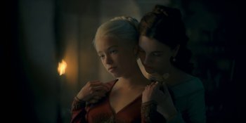 Movie still from “House of the Dragon” (2022), created by George R.R. Martin – Two women standing next to each other in a room; Close Up shot, Low angle