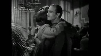 Movie still from “The Story of Film: A New Generation” (2021), directed by Mark Cousins – A man and a woman hugging each other in front of a plant; Medium shot, Over the shoulder angle