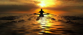 Movie still from “The Strangers: Prey at Night” (2018), directed by Johannes Roberts – A man rowing a boat in the ocean at sunset; Extreme Wide shot, Low angle