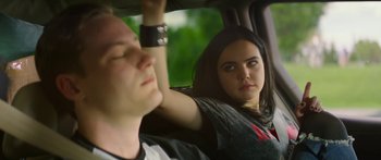 Movie still from “The Strangers: Prey at Night” (2018), directed by Johannes Roberts – A man and a woman sitting in the back of a car; Close Up shot, Over the shoulder angle