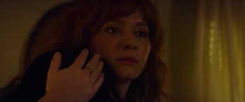 Movie still from “The Strangers: Prey at Night” (2018), directed by Johannes Roberts – A person with a ring on her finger; Close Up shot, Over the shoulder angle