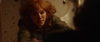 Movie still from “The Strangers: Prey at Night” (2018), directed by Johannes Roberts – A person sitting in front of a sink; Close Up shot, High angle