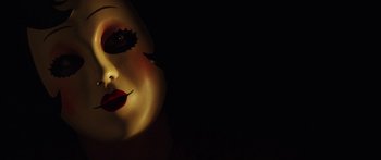 Movie still from “The Strangers: Prey at Night” (2018), directed by Johannes Roberts – The face of a woman wearing makeup; Close Up shot, Low angle