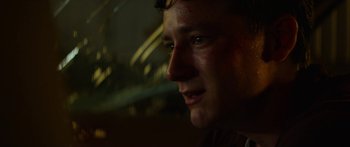 Movie still from “The Strangers: Prey at Night” (2018), directed by Johannes Roberts – A man's face in the dark; Close Up shot, Low angle