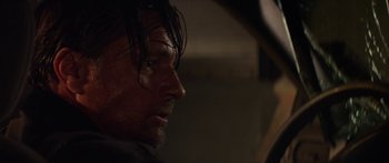 Movie still from “The Strangers: Prey at Night” (2018), directed by Johannes Roberts – A person with wet hair; Close Up shot, Over the shoulder angle
