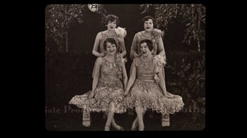 Movie still from “The Sunshine Boys” (1975), directed by Herbert Ross – A group of women sitting on top of a bench; Medium shot, High angle
