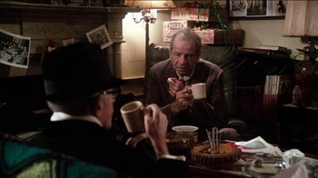 Movie still from “The Sunshine Boys” (1975), directed by Herbert Ross – Two men sitting at a table drinking coffee; Medium shot, Over the shoulder angle