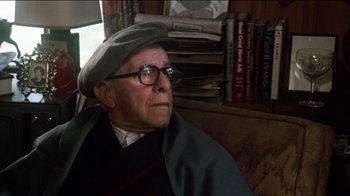 Movie still from “The Sunshine Boys” (1975), directed by Herbert Ross – An older man wearing glasses and wearing a hat; Close Up shot, Low angle