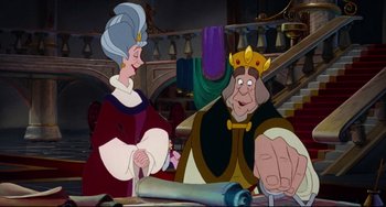 Movie still from “The Swan Princess” (1994), directed by Richard Rich – A couple of people that are standing up in a room; Medium shot, High angle
