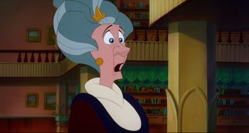 Movie still from “The Swan Princess” (1994), directed by Richard Rich – An old woman with a surprised look on her face; Close Up shot, Over the shoulder angle