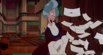 Movie still from “The Swan Princess” (1994), directed by Richard Rich – An old woman is smiling while looking at papers on the floor; Medium shot, High angle