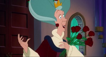 Movie still from “The Swan Princess” (1994), directed by Richard Rich – A woman with a crown on her head holding a bouquet of roses; Medium shot, Over the shoulder angle