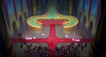 Movie still from “The Swan Princess” (1994), directed by Richard Rich – An aerial view of a stage with people around it; Extreme Wide shot, Overhead angle
