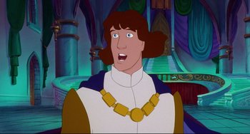 Movie still from “The Swan Princess” (1994), directed by Richard Rich – A man with a long brown hair wearing a gold necklace; Close Up shot, Over the shoulder angle
