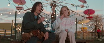 Movie still from “The Sweet Hereafter” (1997), directed by Atom Egoyan – A man and a woman sitting next to each other; Medium shot, Low angle