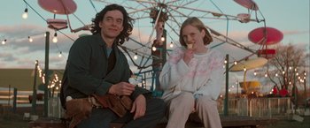 Movie still from “The Sweet Hereafter” (1997), directed by Atom Egoyan – A man and a woman sitting on a bench; Medium shot, Low angle