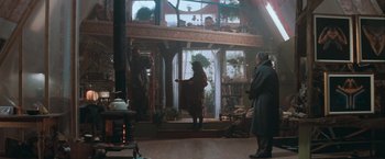 Movie still from “The Sweet Hereafter” (1997), directed by Atom Egoyan – Two people standing in front of a house; Wide shot, Low angle