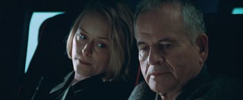 Movie still from “The Sweet Hereafter” (1997), directed by Atom Egoyan – A man and a woman sitting next to each other in a car; Close Up shot, Low angle