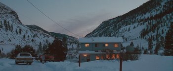 Movie still from “The Sweet Hereafter” (1997), directed by Atom Egoyan – A house in the middle of a snow covered valley; Extreme Wide shot, High angle