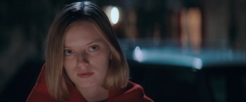 Movie still from “The Sweet Hereafter” (1997), directed by Atom Egoyan – A person wearing a red jacket; Close Up shot, Low angle